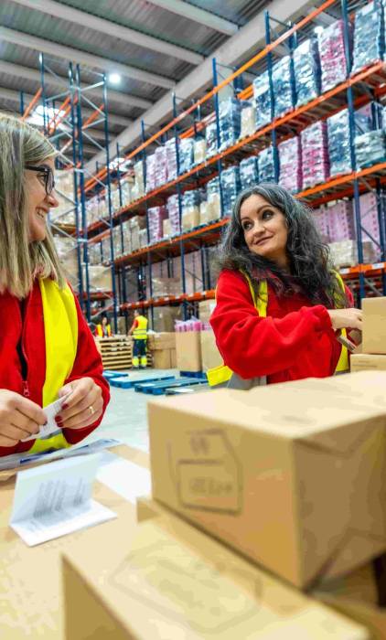 women-organizing-shipments-in-a-distribution-wareh-2024-12-10-03-15-45-utc-min